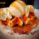 waffle and spiced rum ice cream at the white lion hotel in seaford, east sussex